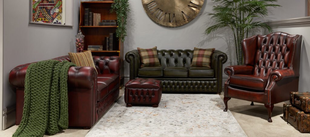 Chesterfield sofa, armchair and ottoman combined in a guest lounge